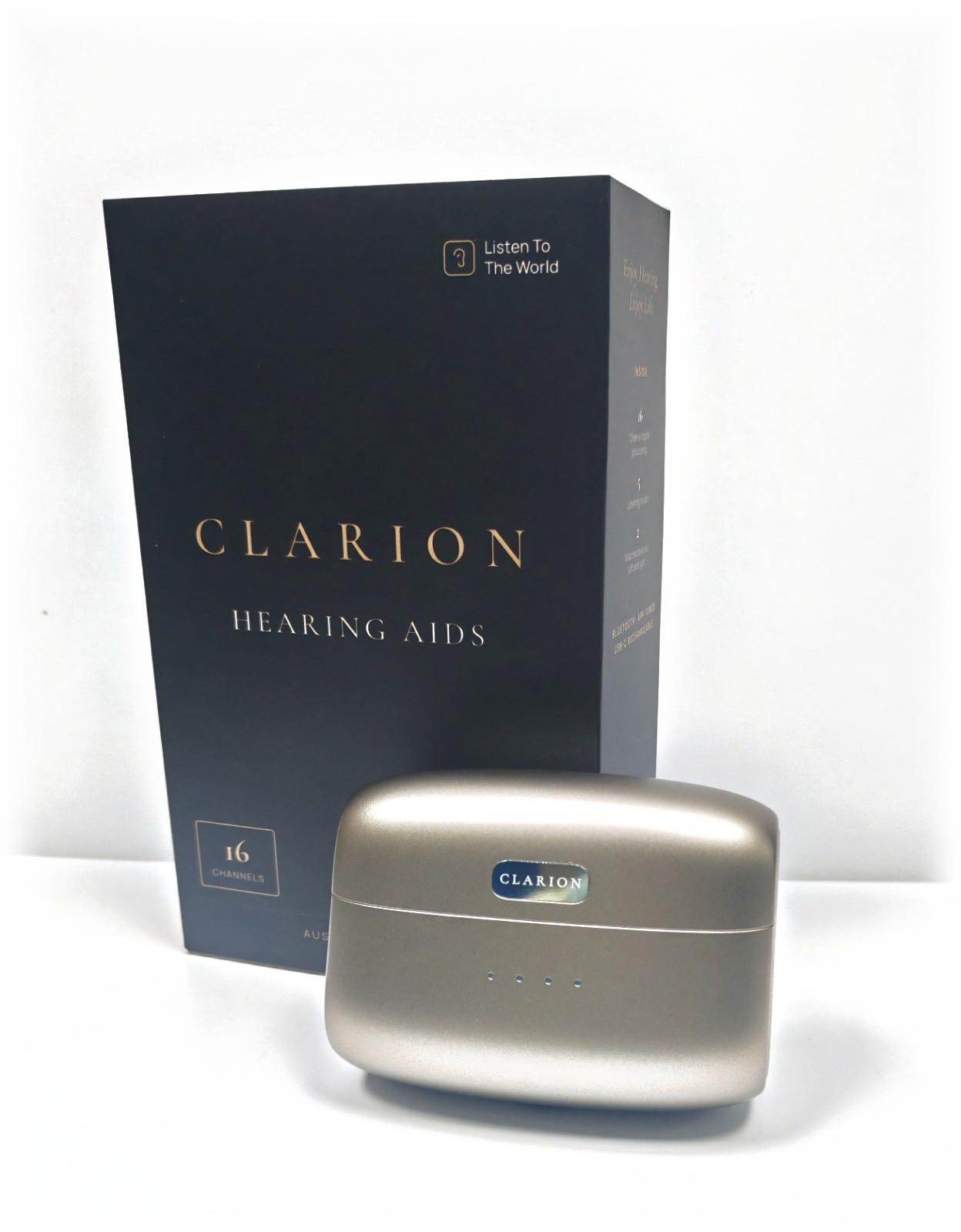 The Clarion retail box standing on white behind the champagne-beige charging case.