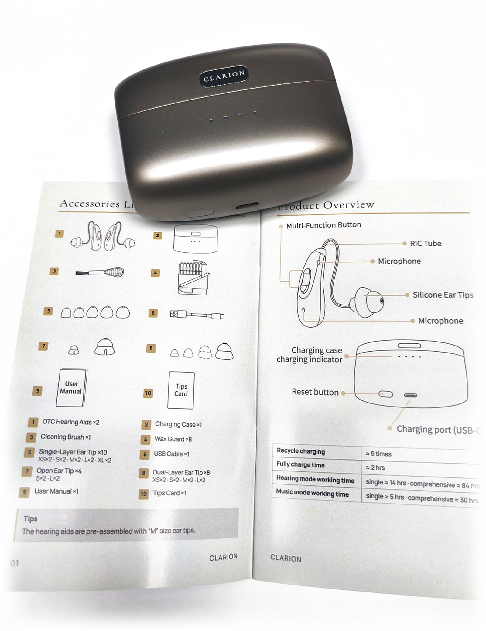 The Clarion charging case resting on the printed 28-page user manual, open on white.