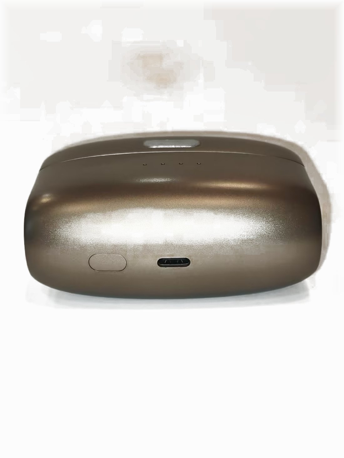 The underside of the Clarion charging case on white, showing the reset button and the USB-C charging port.